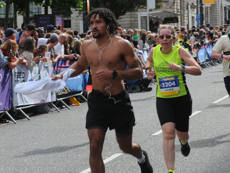 Finishers on The Headrow after a hot run 