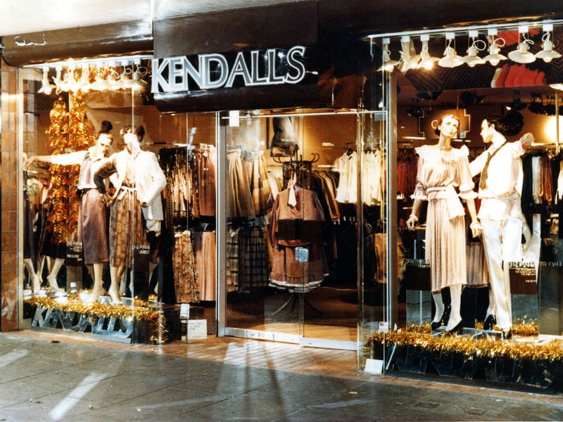 A window display of ladies fashions on sale at Kendall's in Trinity Street Arcade in March 1979. Four mannequins, lit by spotlighting and reflected in mirrored glass, are dressed in styles of the late 1970s. Trinity Street Arcade runs from Trinity Street to Bank Street.