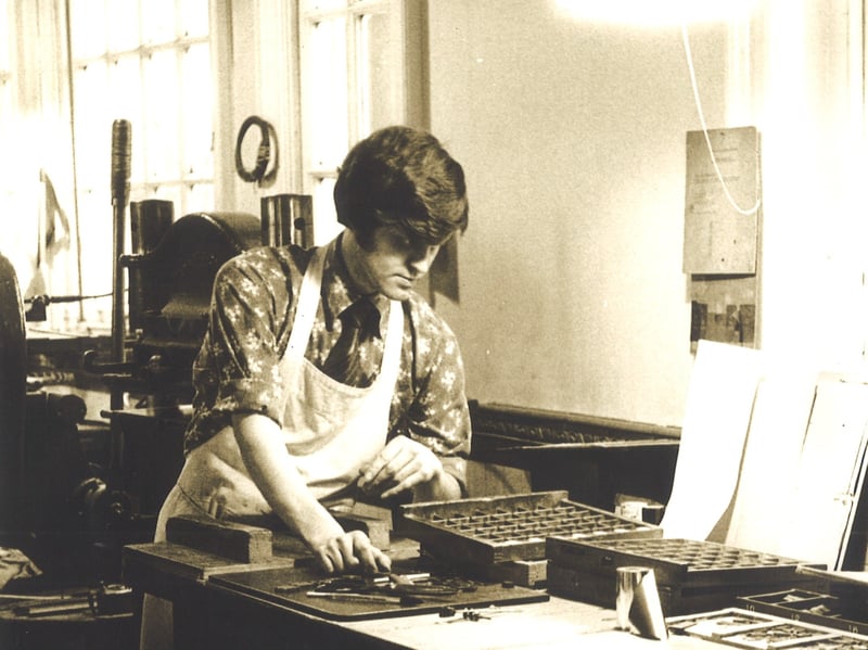 Library staff member Allan Beaumont working in the Binding Department.