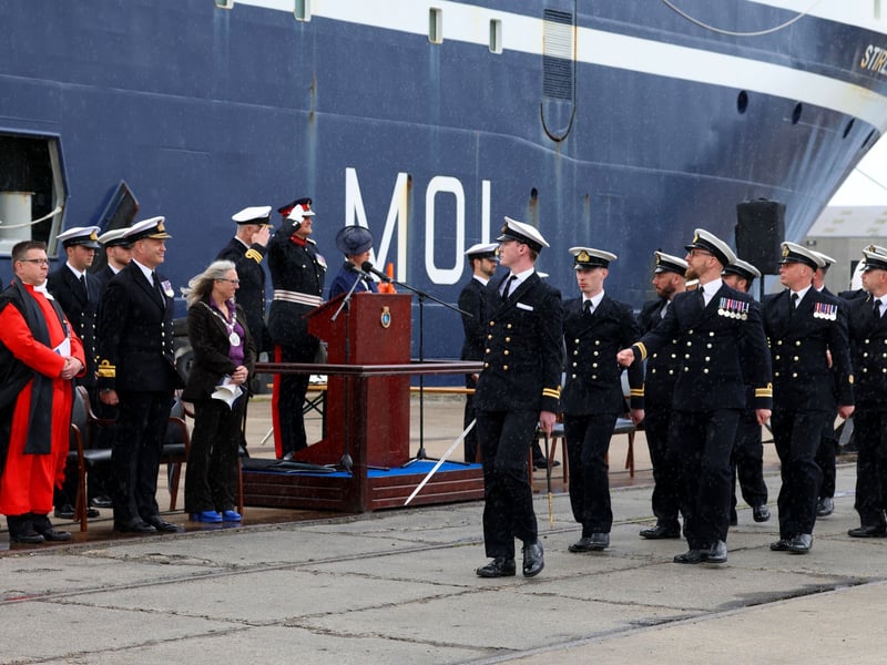 Ship's Company marching past the lectern.