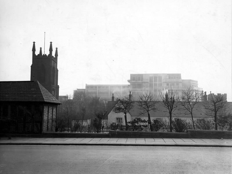 Looking south from Merrion Street across the rest garden towards Lewis's store in March 1948. St John's Church is on the left.