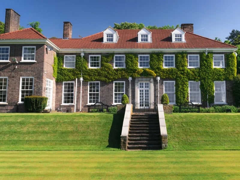 This stunning 1930s family home is set in 10 acres of beautiful grounds, tucked away in the exclusive Cragg Wood conservation area of Rawdon. As well as seven bedrooms, with en-suites and a family bathroom, there are three large south-facing reception rooms, a cinema/games room, a family dining room/kitchen, a study/playroom and a formal drawing room.