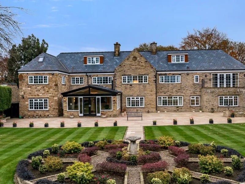 This magnificent family home is situated in the heart of sought-after Alwoodley, in North Leeds, within walking distance of The Grammar School at Leeds, and close to several top golf courses and Eccup reservoir. It boasts six bedrooms, three reception rooms, a conservatory and an office, plus large grounds with an extensive stone-paved terrace and generous lawned areas.
