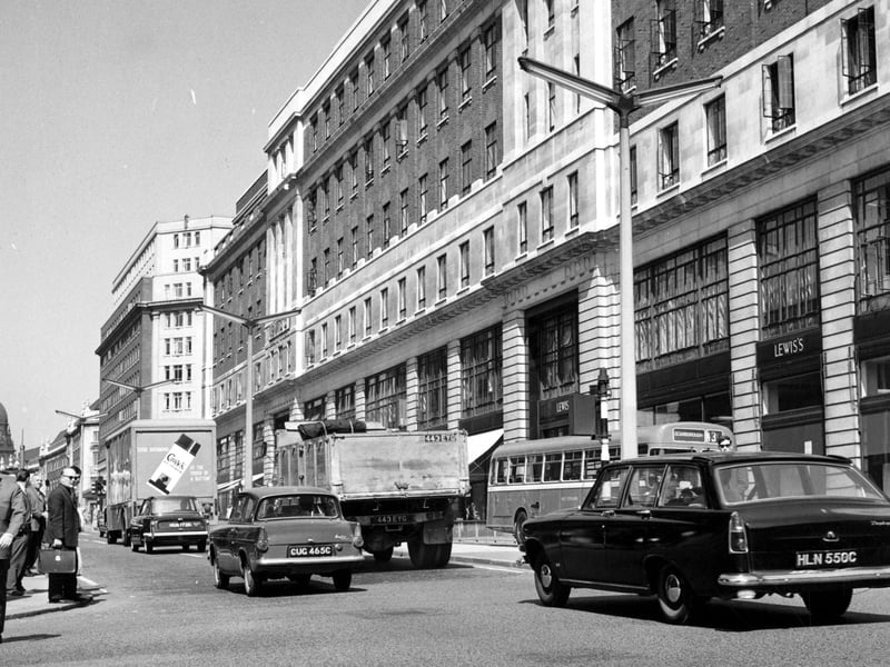 Traffic congestion on The Headrow in front of Lewis's department store.