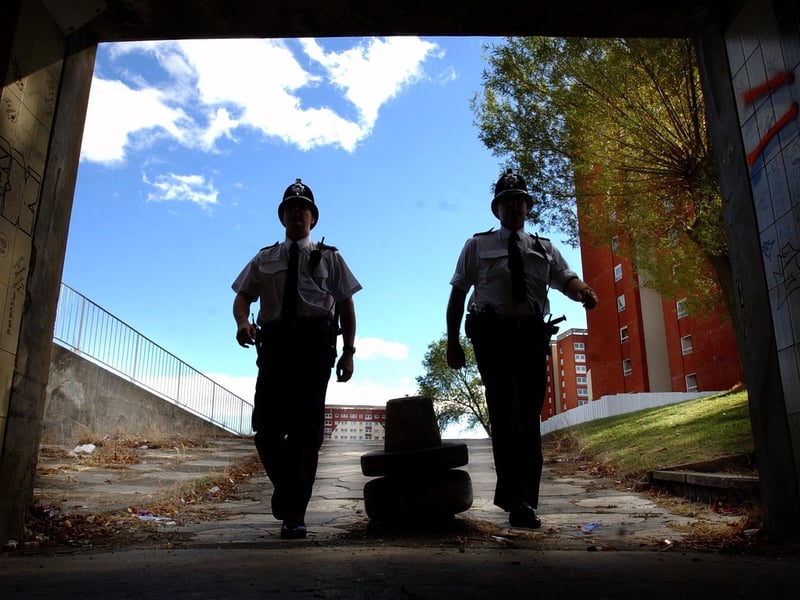 Community police officers P.C. Steve Kinnon, left, and P.C. Brian Howard on their beat in September 2003.