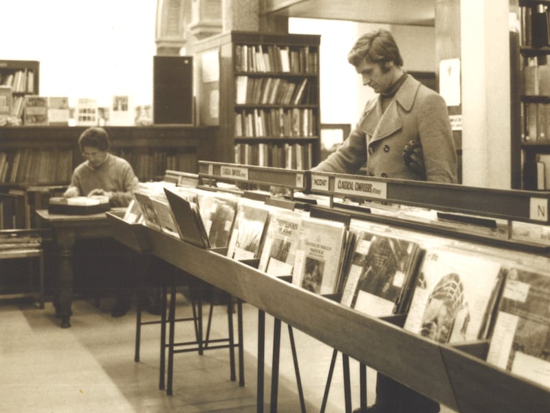The Music Library on the ground floor of Leeds Central Library. A mezzanine floor has been created to the right but this has since been dismantled. Tony Bainbridge can be seen looking at vinyl records.