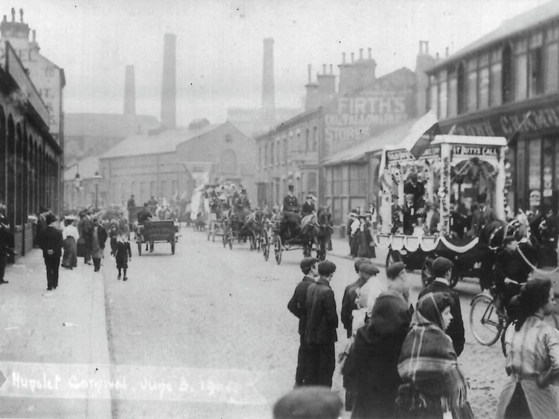 Hunslet Carnival looking north along Hunslet Road. People are on the roads and pavements watching a procession of horse and carts go past. Pictured in June 1906.