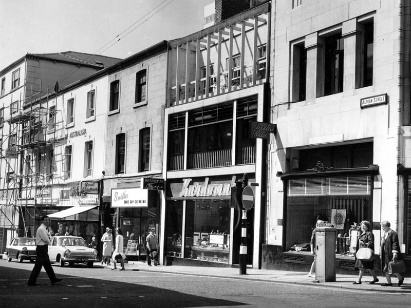 A view down Albion Street showing Kardomah Cafe. Also visible are Smith's cleaners and Austin Reed.