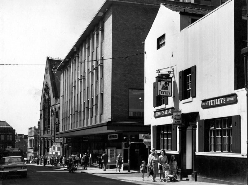 Lands Lane showing the King Charles pub and Schofields store.