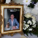 A preliminary hearing at Belfast Coroner’s Court on Monday morning heard about preparations for the inquest. Pictured is an image of Galway boxer John Cooney, laid out during his funeral Mass at the Church of St John the Apostle, in Knocknacarra (PA).