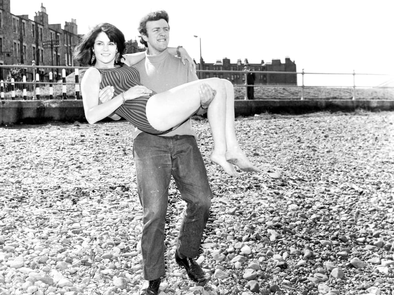 British actress Diana Quick, in Edinburgh for the Festival , takes a dip in the sea at Portobello in August 1966.