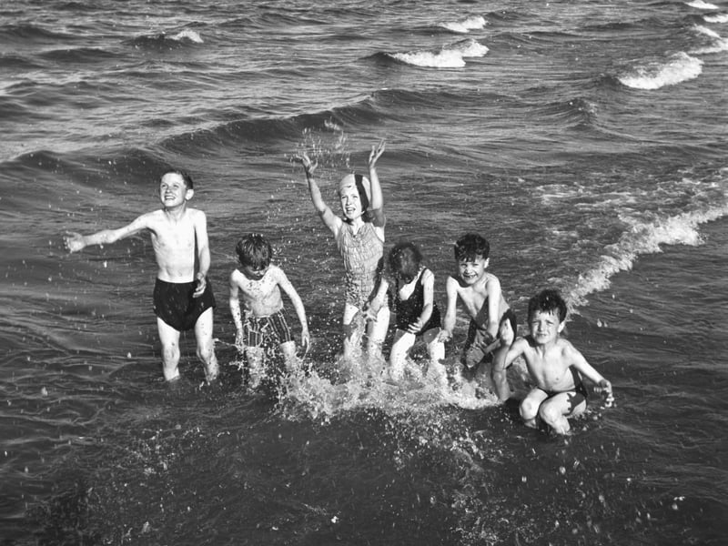 Children playing in the sea at Portobello in July 1966.