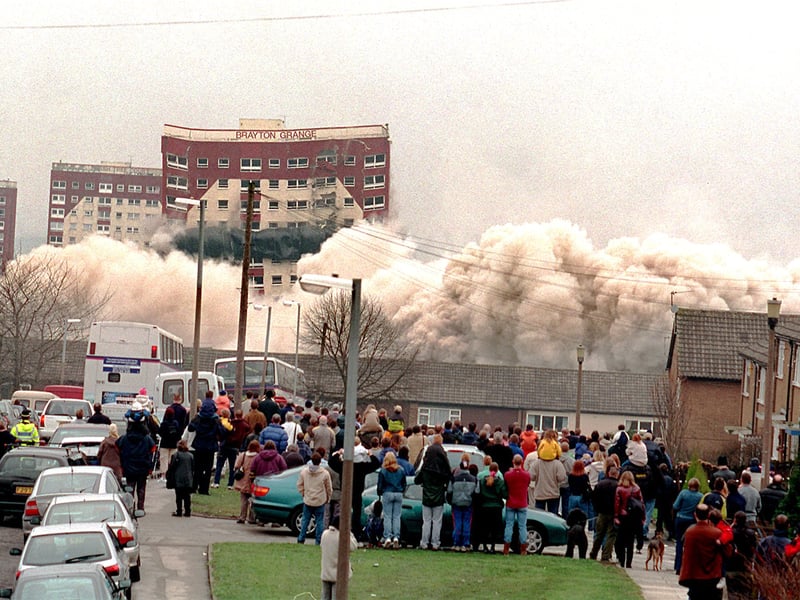 The demolition of Brayton Grange in the dust from the wreckage of Farndale Court.