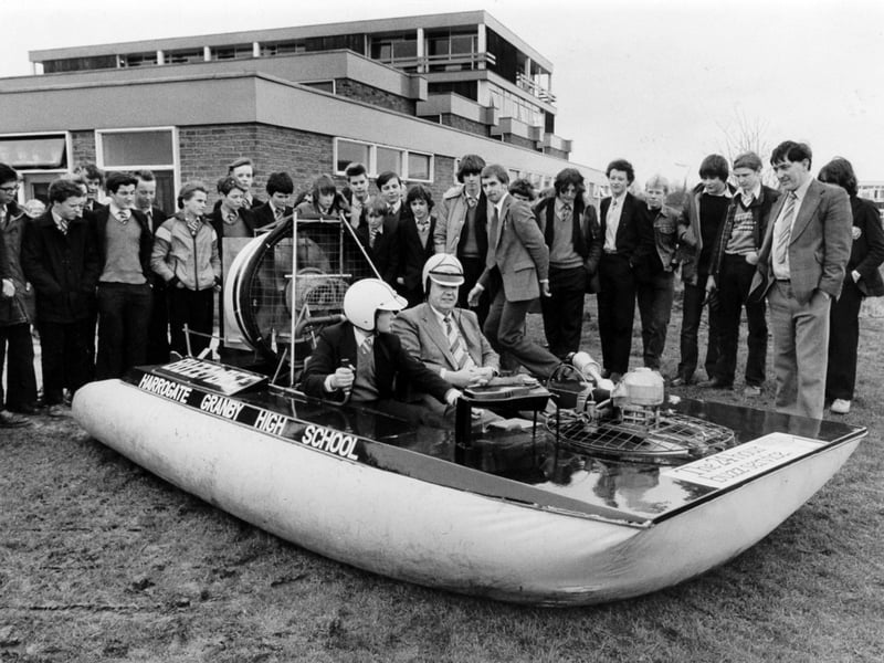 Pupils at Granby High School, in Harrogate, launch their hovercraft, Buzz Bee, in March 1981. It was built by groups from the school's design, craft and technology department, guided by Neville Wardle and David Smith. Mr Smith is seen here taking the controls on the maiden run, accompanied by the governors' chairman, Dr Lyle Isaacs.