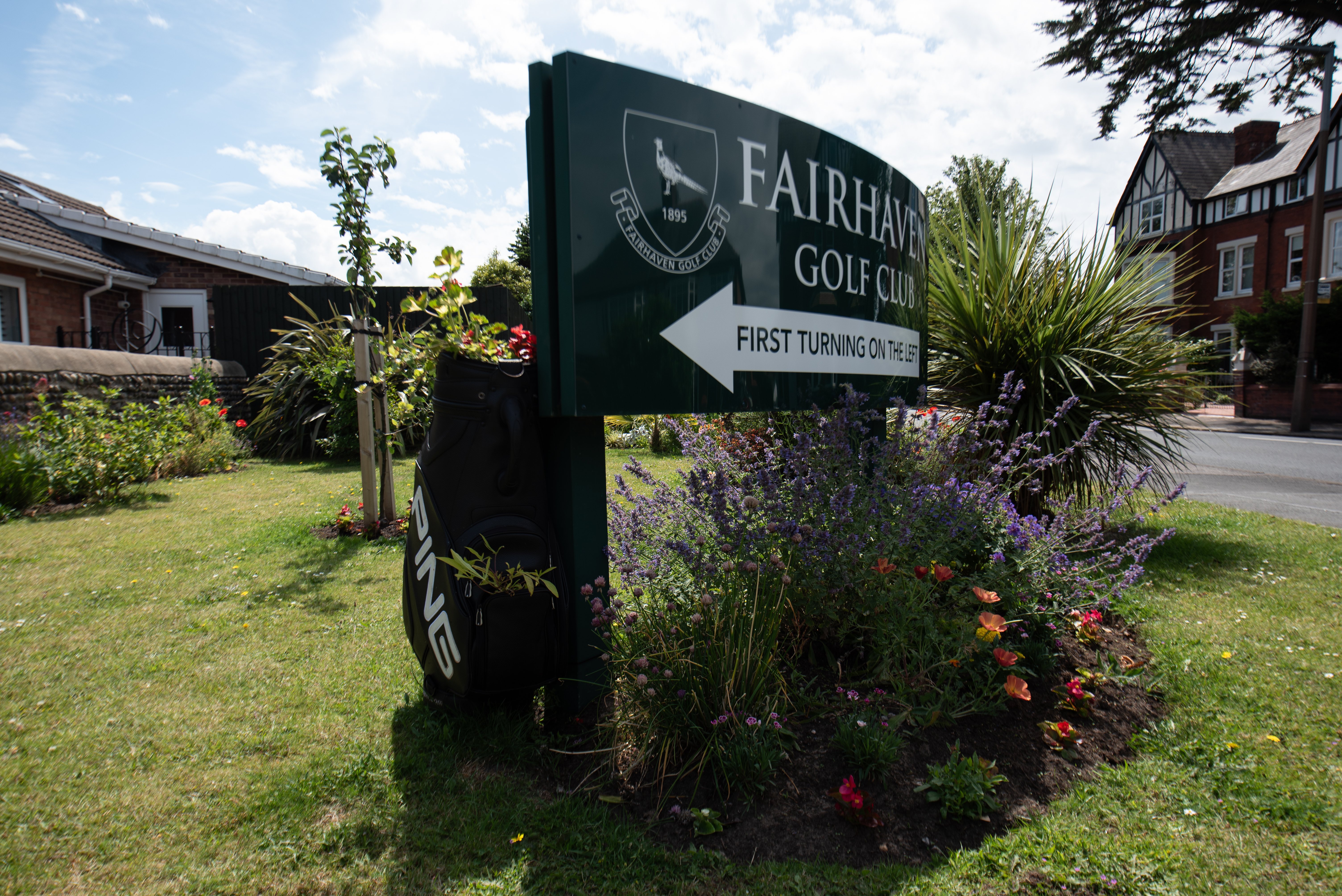 Ansdell In Bloom volunteers have repurposed a couple of golf club bags into quirky planters to welcome golfers. Photo: Lucinda Herbert