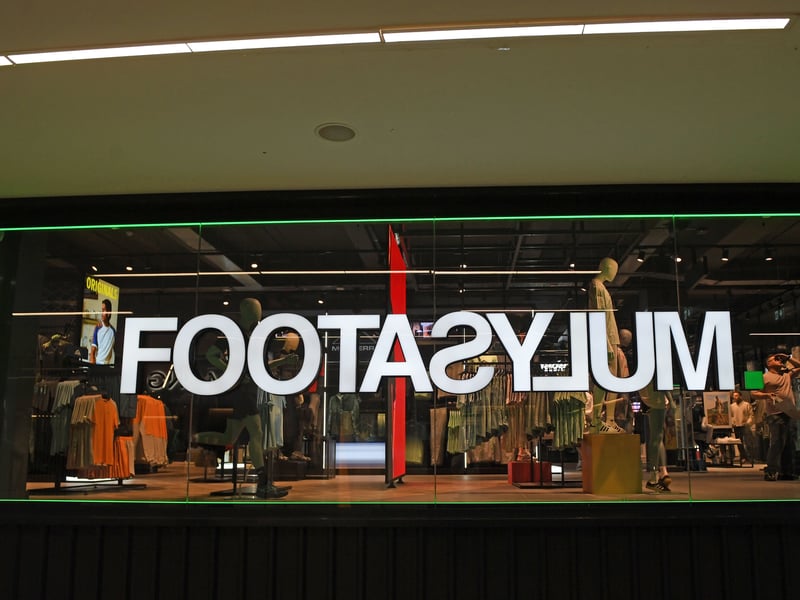 A first look at the striking new glass façade of the permanent Footasylum flagship on the lower ground floor of Trinity Leeds.