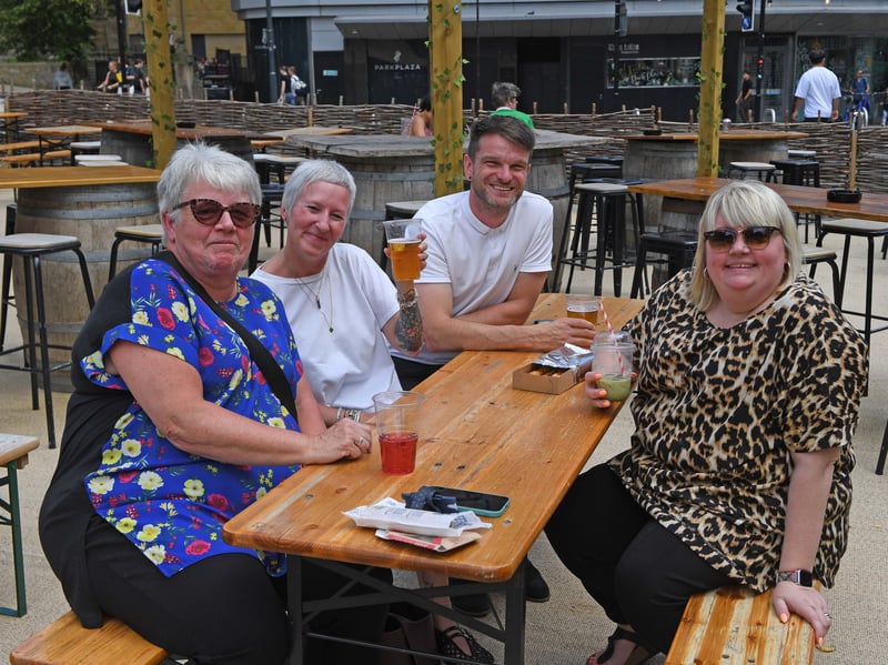 A group of people taking in a frosty(ish) beverage at Tipi's Lounge in City Square