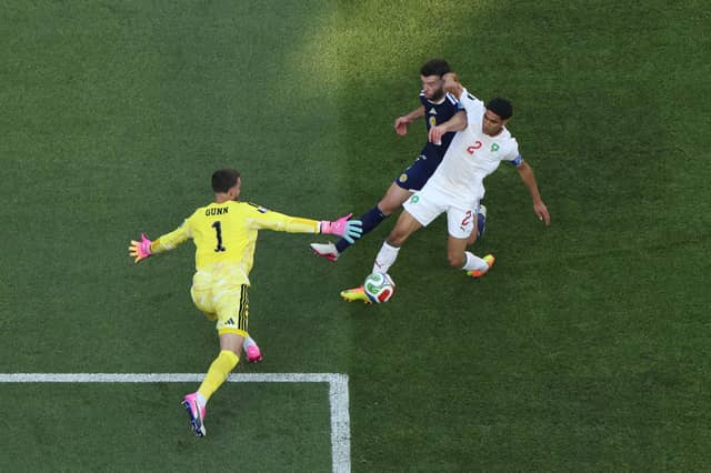 No chance with Saibari's goal. Made three good saves to keep the score down. One of Scotland's best players. 7