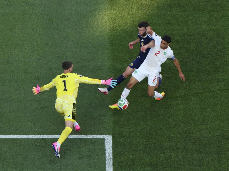 No chance with Saibari's goal. Made three good saves to keep the score down. One of Scotland's best players. 7