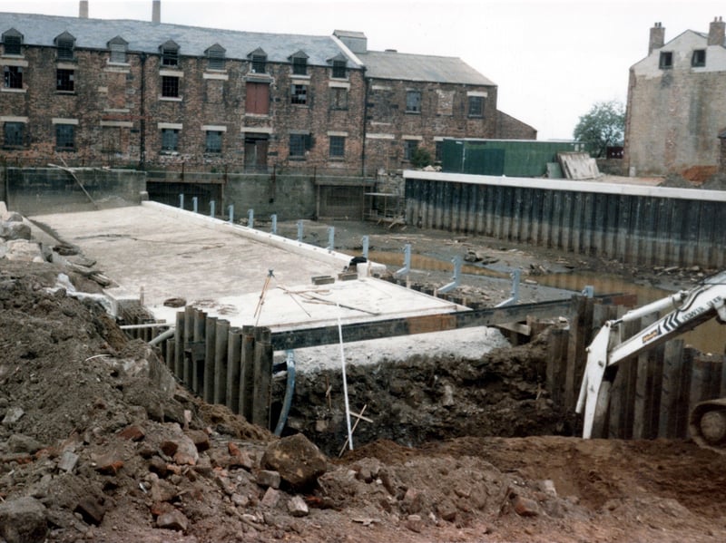 Construction of a new weir at Thwaite Mills circa 1985. The mills at this time were being redeveloped and restored before opening as a museum in 1991.
