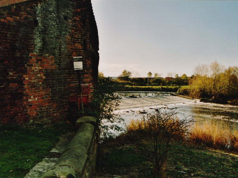 Looking on to weir at Thwaites Mills Museum in November 1999.