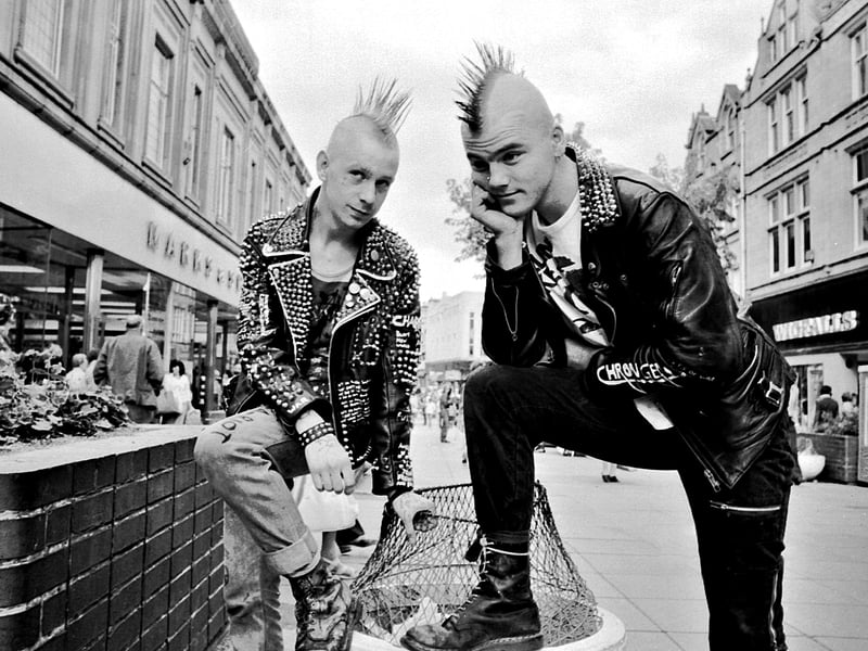 Punks with mohawk hair-dos are pictured on Southgate, Halifax town centre, in around 1981