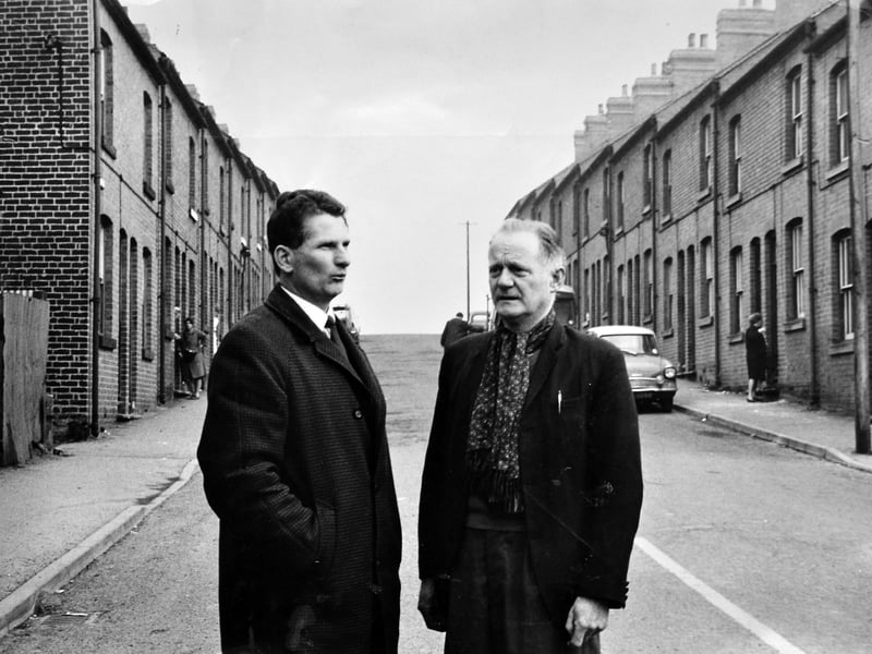 Highley miners Mr D Woodman and Mr H Oakley stand in earnest conversation on a terraced village street in February 1968. With rumours of Highley Colliery's impending closure circulating, Mr Woodman had already begun searching for new work, while Mr Oakley pondered what lay ahead. Though the pit held on until 1969, this poignant snapshot captures a crucial moment in Shropshire's industrial history, reflecting the resilience and quiet dignity of the local mining community. Do you remember Highley Colliery during its final years, or do you recognise this terraced street in the village?