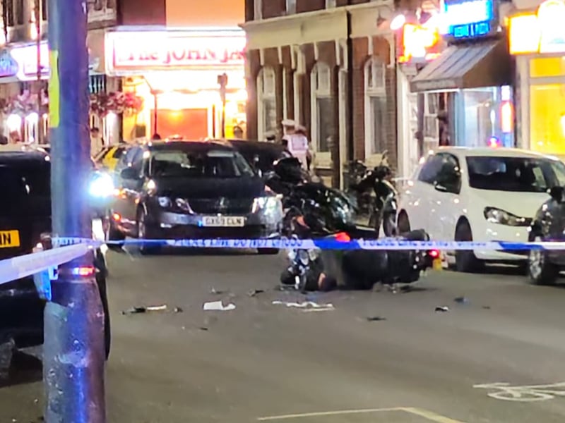 A moped rider is fighting for his life following a crash with a parked car in Fratton Road on June 20.