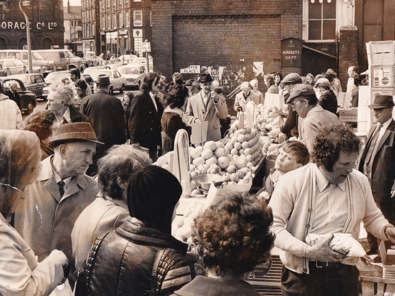 Shoppers look at the fruit and veg on offer in May 1974.