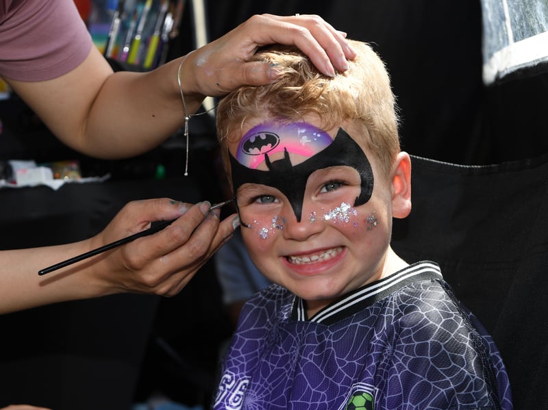 Four-year-old Toby Walsh has his face painted.