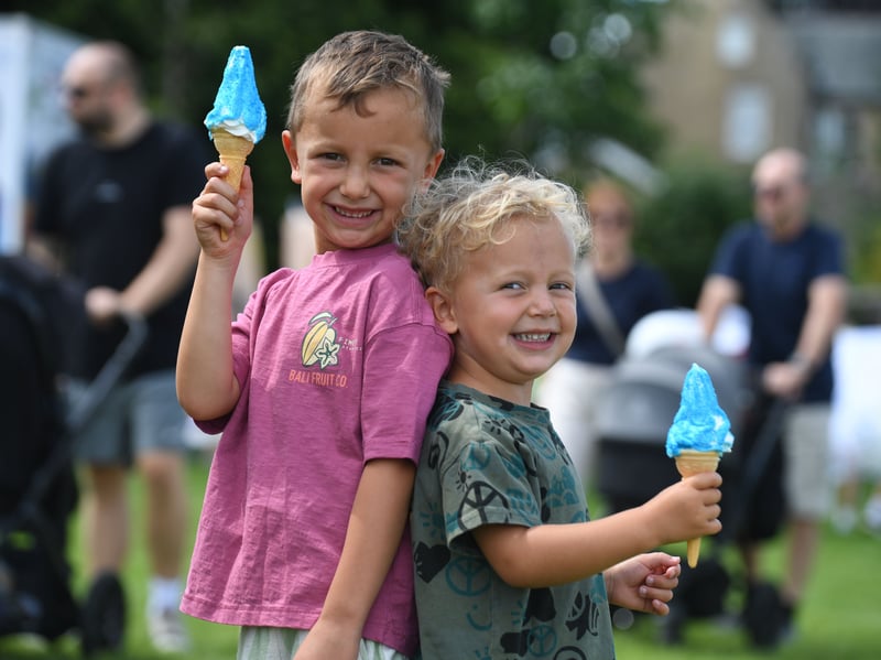 Brothers Beau and River enjoy ice creams at the festival.
