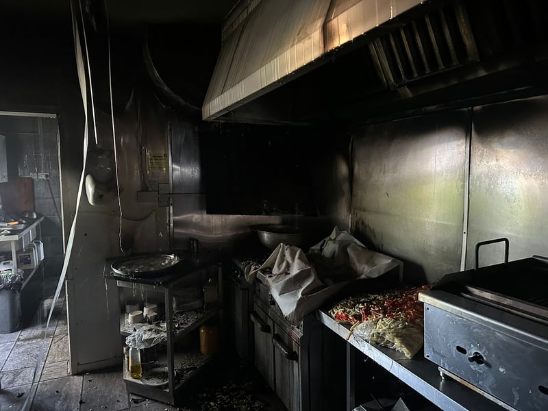 Smoke poured out of a takeaway in Cosham and spread to a nearby flat and over the railway line. Pictured is the inside of Royal Kebab House.