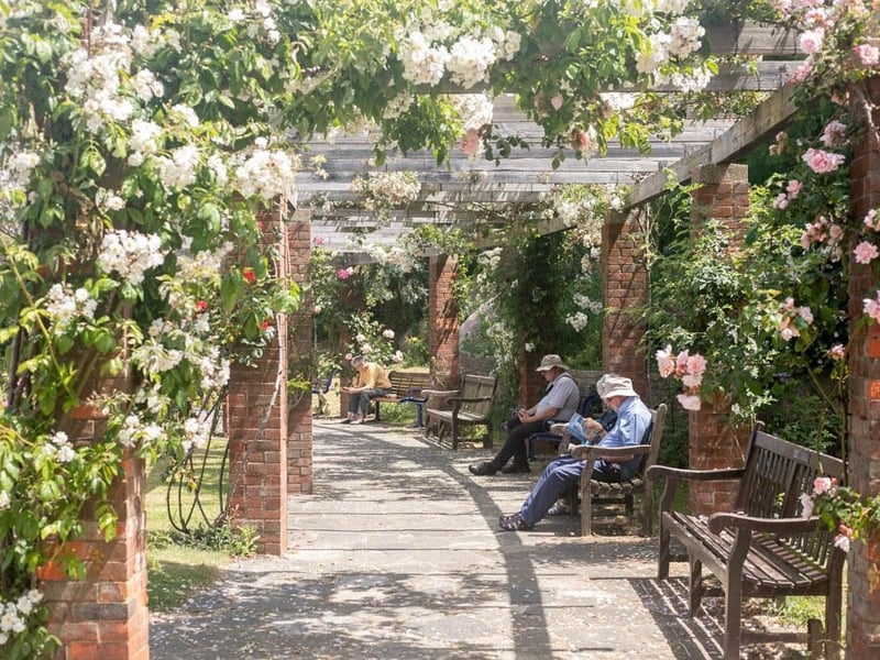 People at the Rose Garden, Southsea.