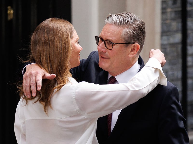 Prime Minister Keir Starmer hugs his wife, Victoria Starmer, after announcing his resignation as UK Prime Minister.