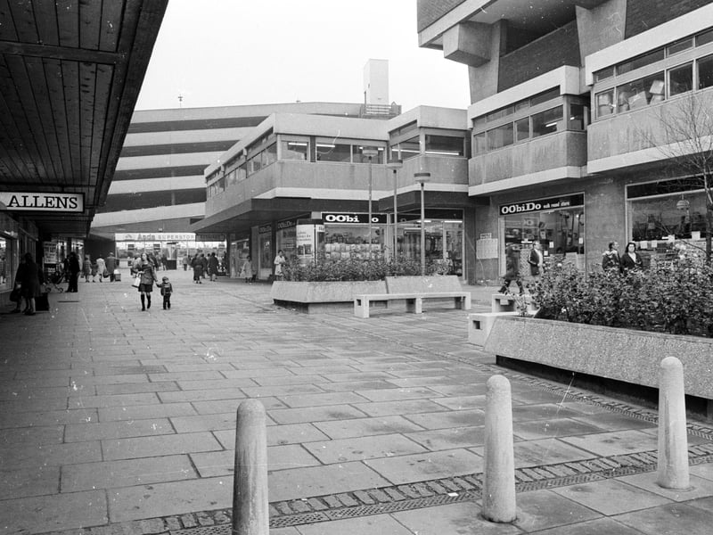 The pedestianised area and multi-storey car park in Kirgate in 1975. The area, at the bottom end of Ridings, is now all covered in.