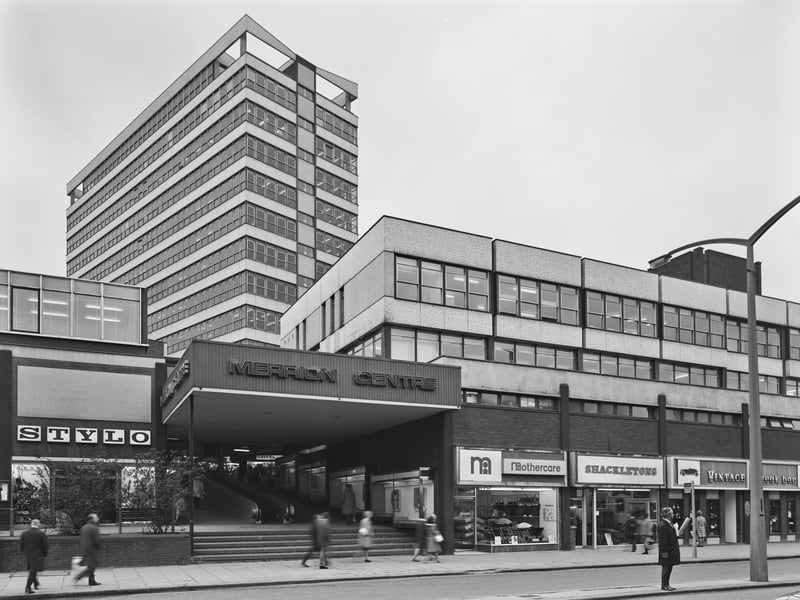 Shopfronts for Stylo, Mothercare, Shackletons, and the Vintage Steak Bar, on either side of the steps leading into the Merrion Centre, Leeds, in April 1971