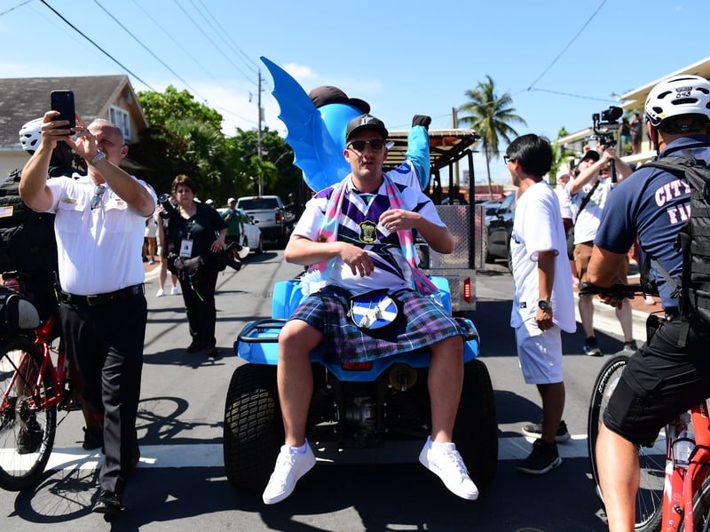 The Tartan Army march to LoanDepot Park in Miami.
