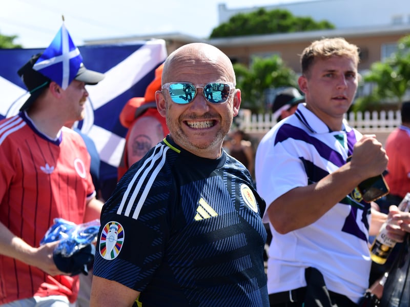 The Tartan Army march to LoanDepot Park in Miami.