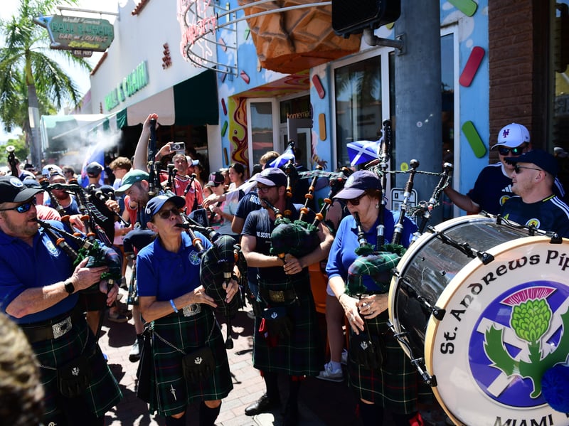 The Tartan Army march to LoanDepot Park in Miami.