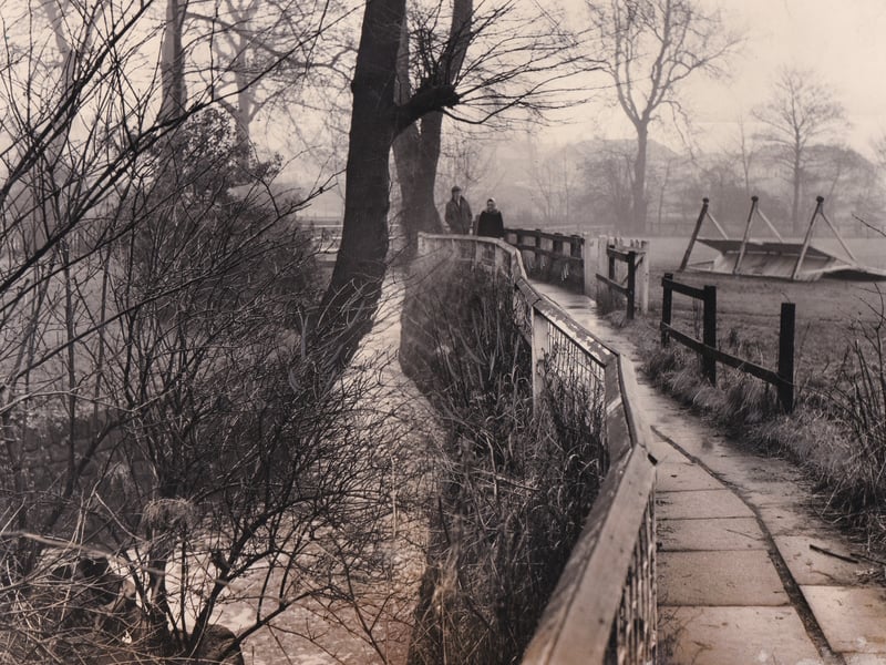 The unlit pathway that crossed Meanwood Beck and runs alongside Highbury cricket ground. Pictured in January  1970.