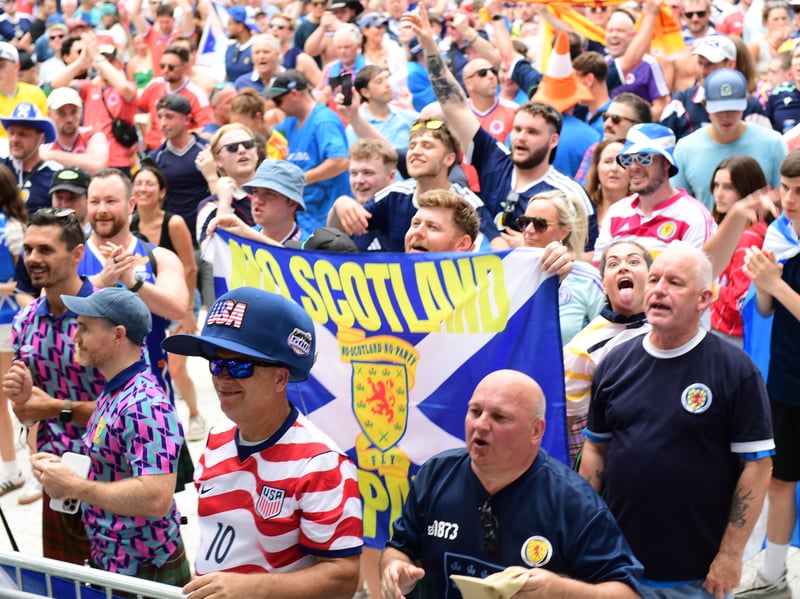 The Tartan Army march to LoanDepot Park in Miami. 