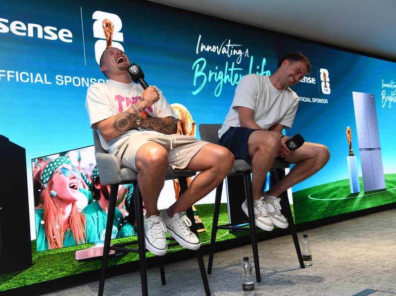 Former Leeds team mates Patrick Bamford and Kalvin Phillips share a laugh on stage during the q&a for the Hisense World Cup Party at Elland Road.