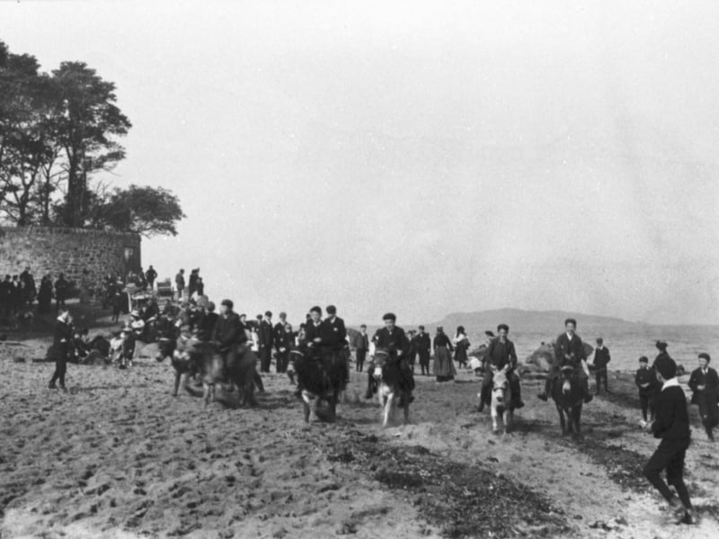 Edinburgh holidaymakers taking part in the donkey races on Cramond Beach in around 1900.