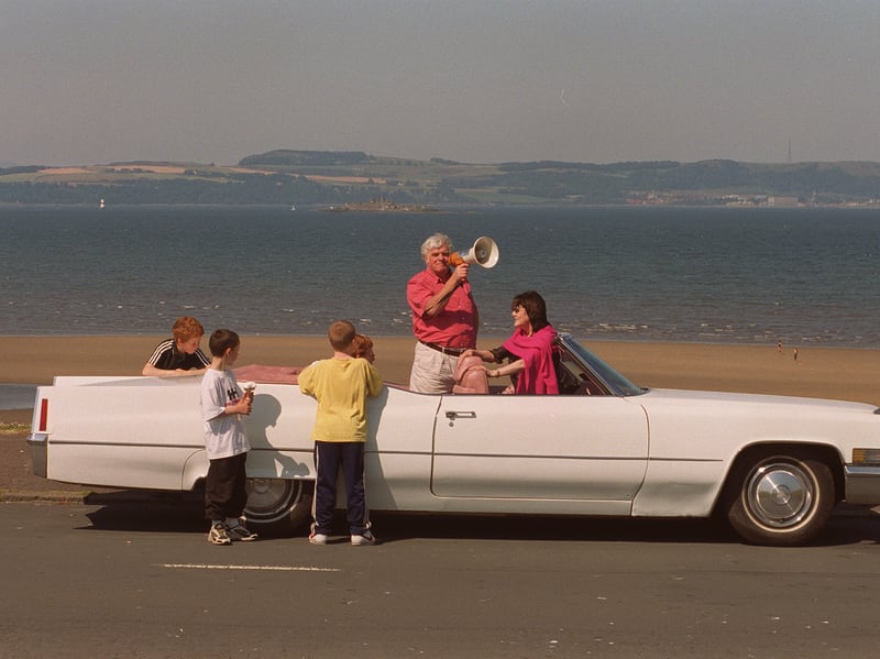 Take The High Road cast take part in a recruitment drive by R Croan and Sons on Cramond Beach in July 2000.