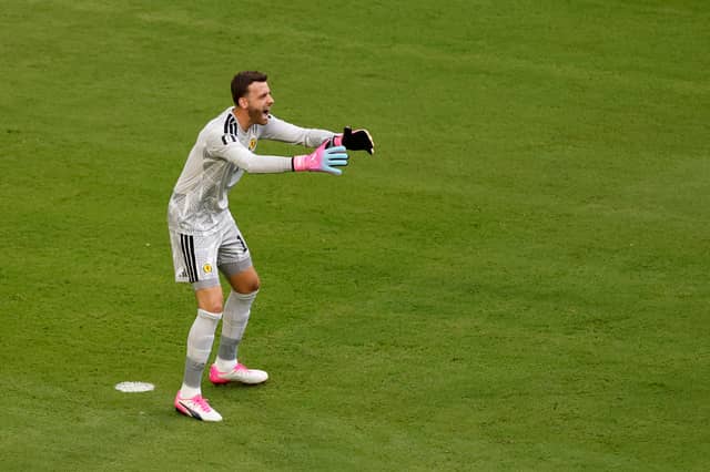 Made good saves from Vinicius Jnr twice and Rayan. Got caught under the ball for Brazil's second but kept score down. 6
