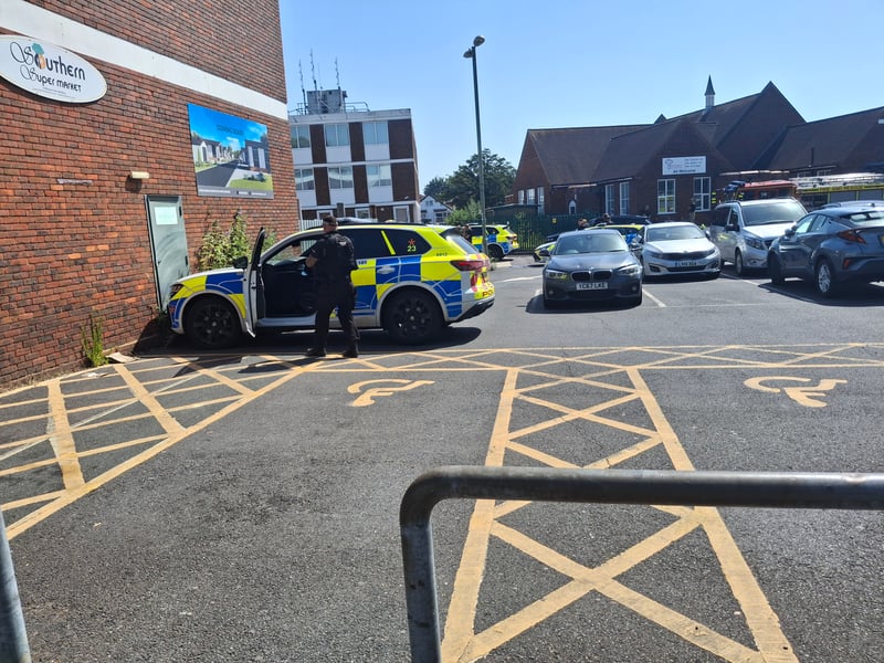 Armed police and fire crews have been deployed to Portchester Precinct, with part of the area "sealed off" from the public.