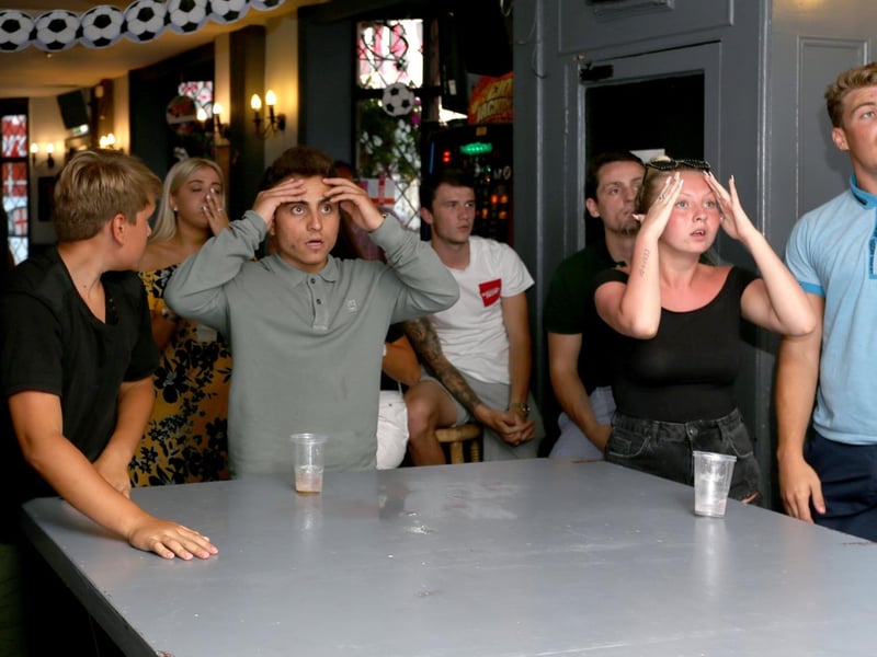 Shocked fans at the Milton Arms react to Croatia's second goal in the 2018 World Cup semi final 