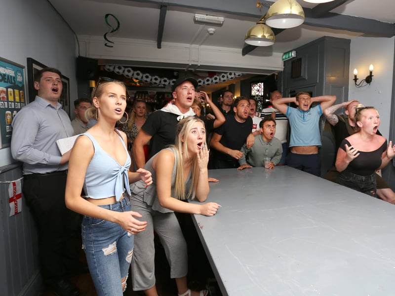 Fans watching England v Croatia at The Milton Arms in Portsmouth react as Croatia score an equaliser in the World Cup semi final in 2018 
 