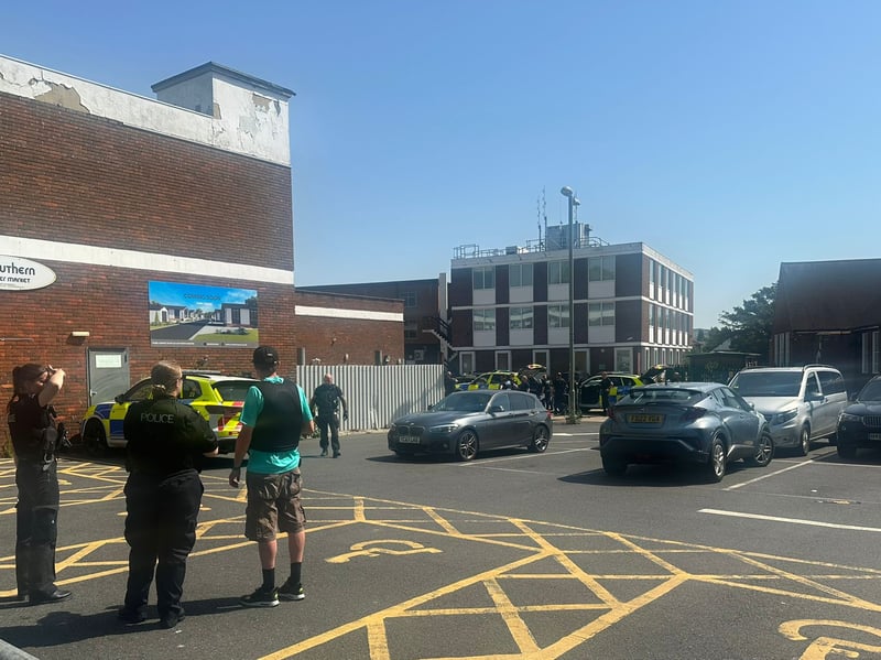 Armed police and fire crews have been deployed to Portchester Precinct, with part of the area "sealed off" from the public.