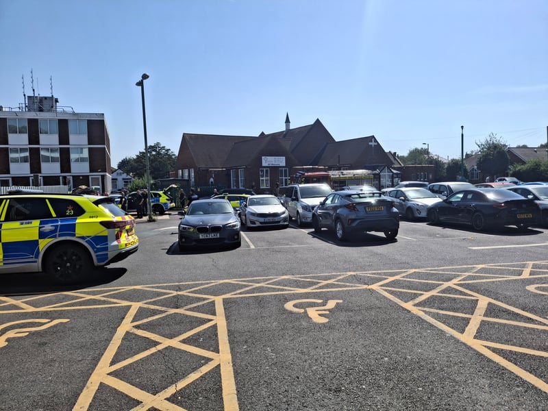 Armed police and fire crews have been deployed to Portchester Precinct, with part of the area "sealed off" from the public.